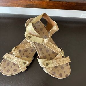 Axxiom adjustable sandals in a size 9